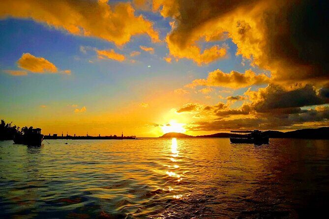 Luxury Catamaran Champagne Sunset Cruise - After sunset: Charlotte Amalie harbor lights and yacht-watching