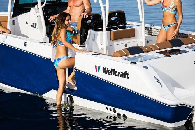 Private Full Day BVI Boat Charter Aboard MV Aquarius - MV Aquarius on the water: a fast 31-foot boat with real comfort